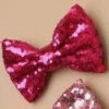 Ladies 1980s Bright Pink Sequin Bow Hair Clip 2 Ladies 1980s Bright Pink Sequin Bow Hair Clip -Halloween Fans Shop 6674 bright pink